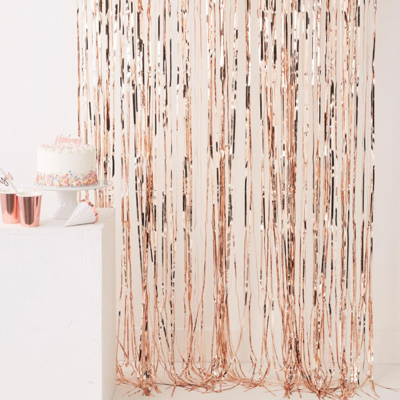 Rose gold fringe curtain measuring 2.5m x 1m, perfect for glamorous party backdrops and celebratory decor.