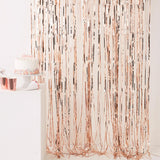 Rose gold fringe curtain measuring 2.5m x 1m, perfect for glamorous party backdrops and celebratory decor.