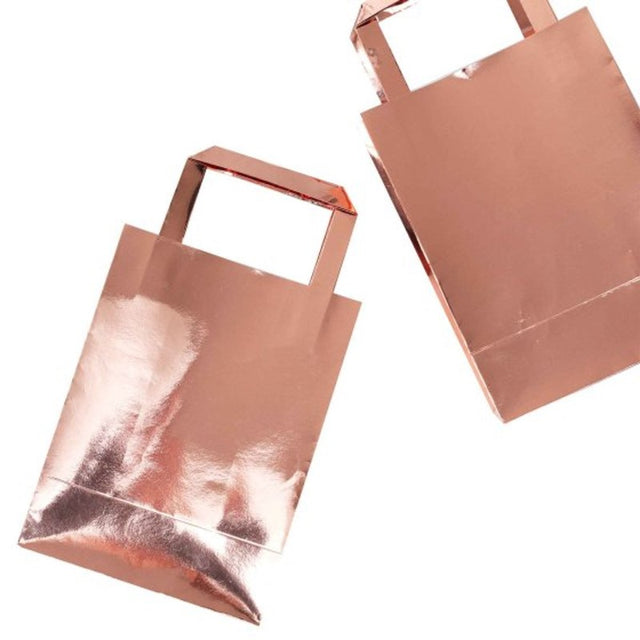 Chic rose gold party bags pack of 5, perfect for events, measuring 15cm x 26cm x 9cm, made from durable paper.