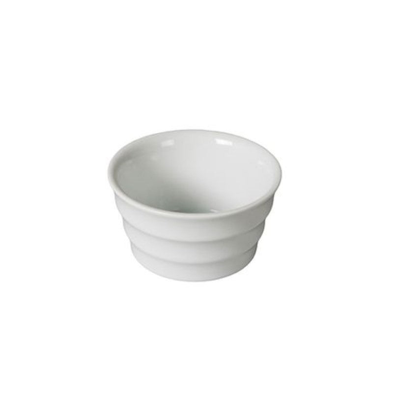 Set of 4 elegant white porcelain ramekins, perfect for serving sauces and desserts at any dining occasion.