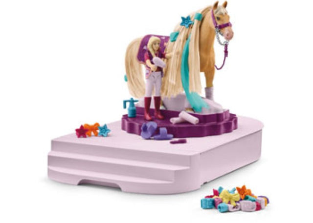 Colorful Horse Grooming Station playset with tools and figurines for imaginative equestrian adventures for ages 3 and up.