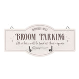 Whimsical wall hook sign with broom illustration and text 'Witches Only - Broom Parking' for organized witchy decor.