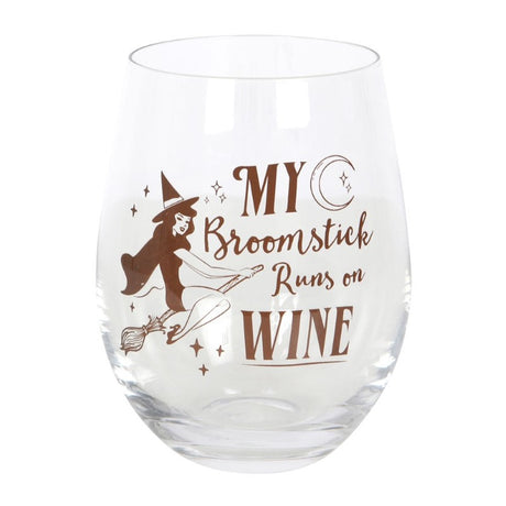 Whimsical stemless glass featuring a flying pin-up witch and the phrase "My broomstick runs on wine," holding 500ml.