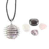 "DIY crystal necklace kit featuring amethyst, rose quartz, clear quartz, and hematite in a nickel-free spiral cage."