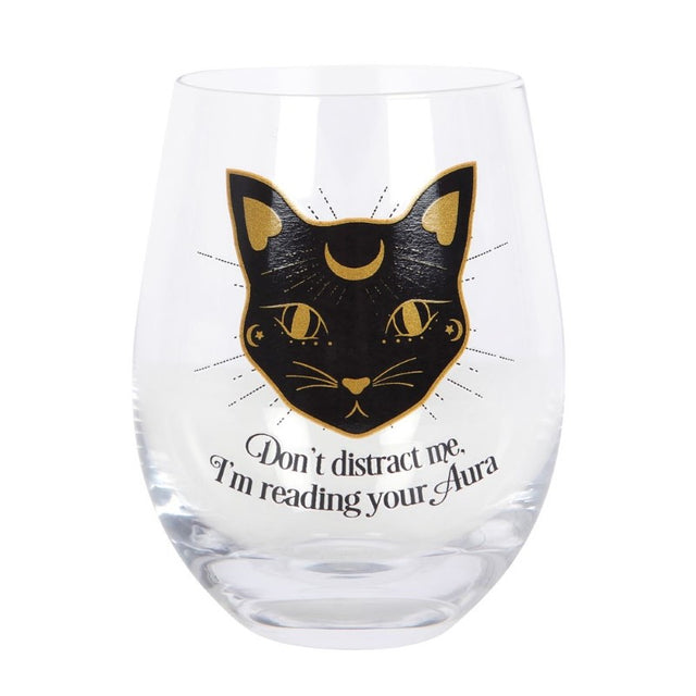 Stemless wine glass featuring a playful black cat and whimsical 'Don't distract me, I'm reading your aura' phrase, 500ml capacity.