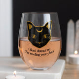 Stemless wine glass featuring a playful black cat and "Don't distract me, I'm reading your aura" text, 500ml capacity.