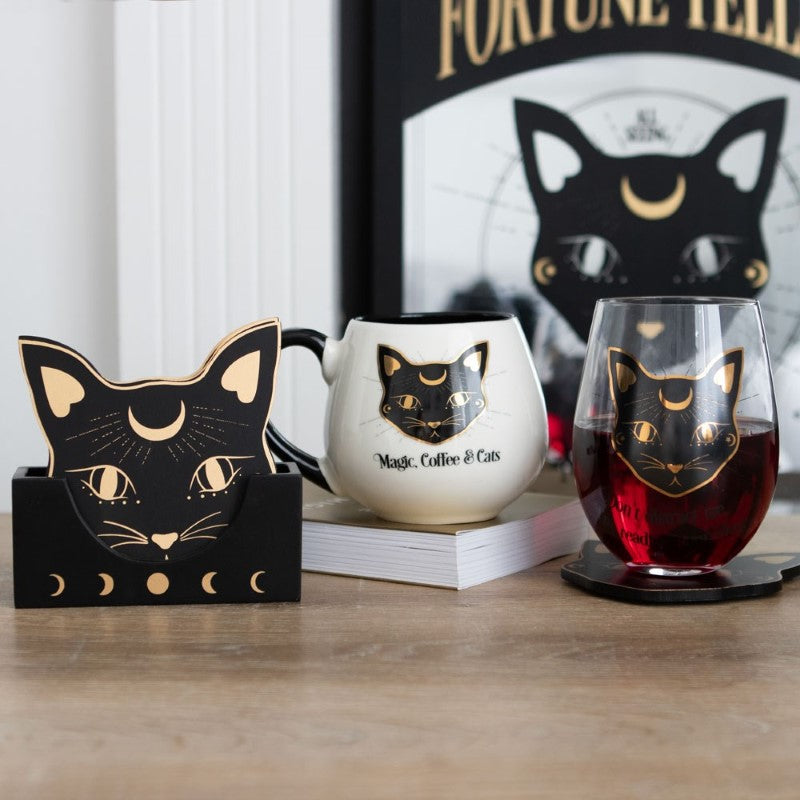 A whimsical stemless wine glass featuring a black cat and the phrase "Don't distract me, I'm reading your aura."