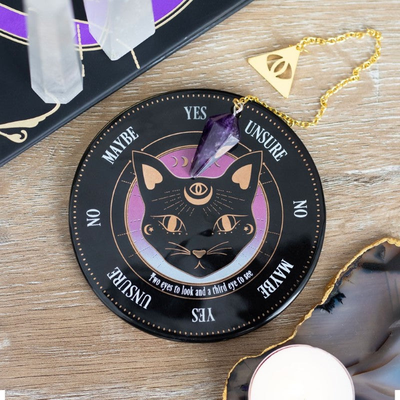 Mystic Mog Pendulum Kit featuring an amethyst pendulum and third eye divination board for intuitive spiritual guidance.