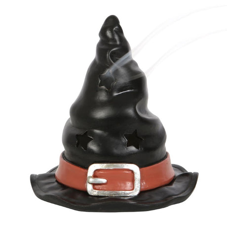 Witch Hat Incense Cone Burner with star cut-outs, emitting smoke; perfect for witchy decor and enhancing relaxation.