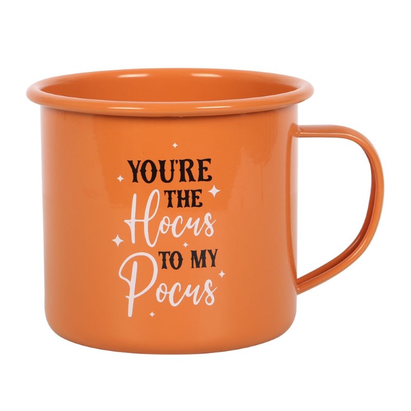 Whimsical orange enamel mug with playful "You're The Hocus To My Pocus" text, perfect for cozy autumn beverages.