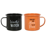 Set of 2 enamel mugs featuring whimsical witch sayings, perfect for cozy drinks and Halloween decor.