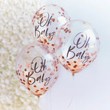 Rose gold confetti balloons with 'Oh Baby' print, perfect for stylish baby showers, packed in a set of five.