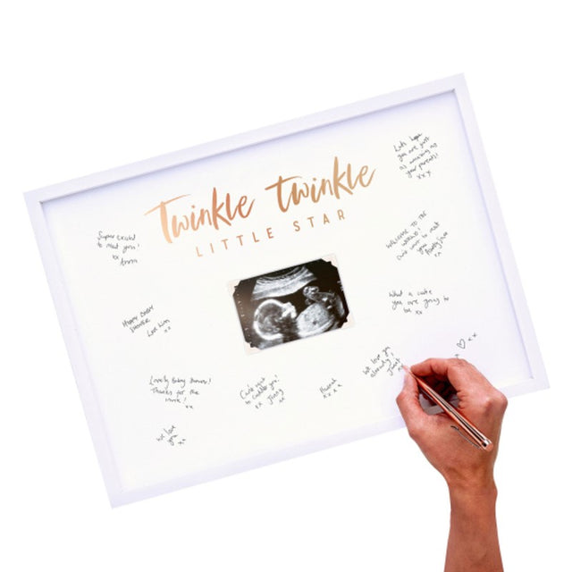 Elegant baby scan frame with rose gold foil, ideal for baby shower guest book and lasting memories of new beginnings.