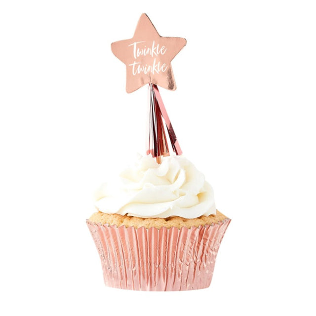 Rose gold star cupcake toppers, 12 pack, adding elegance to desserts for birthdays and baby showers.