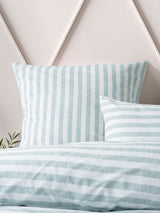 King duvet cover set featuring reversible textured stripes in mineral and white, crafted from 100% cotton for stylish comfort.