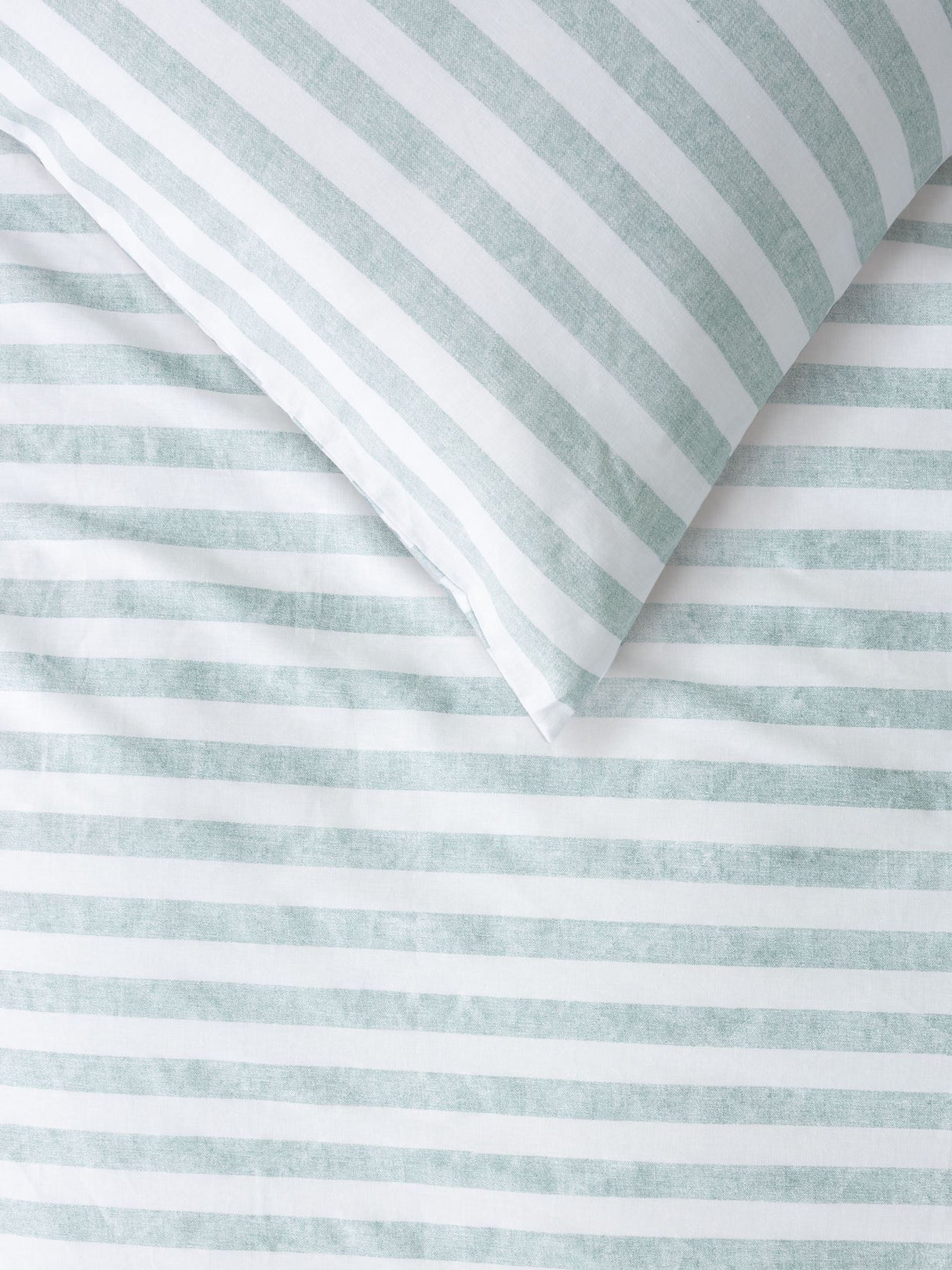King duvet cover set featuring reversible mineral and white striped design, made from 100% cotton for stylish bedroom decor.