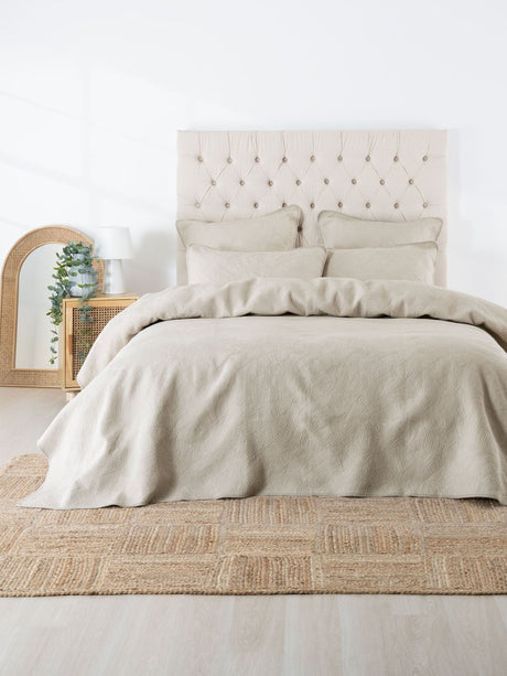 Oatmeal Manon Coverlet Set by Savona featuring a leaf-textured quilt in a calming sand hue, 100% cotton, double/queen size.