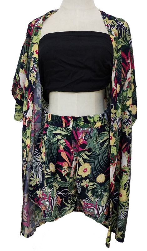 Vibrant shorts set featuring a colorful parrot and monstera leaf print, ideal for tropical lounging or outings.