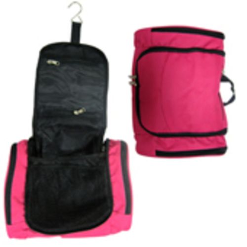 Stylish pink cylindrical cosmetic bag with multiple compartments for organized beauty essentials during travel.