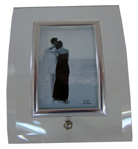 Elegant 2x3" glass photo frame displaying cherished memories, perfect for desks or tabletop decor.