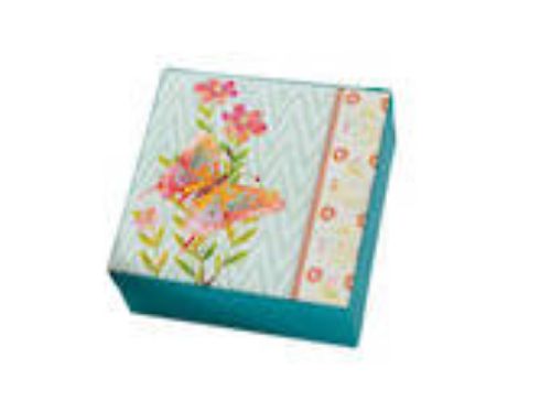 Elegant 15x15cm padded fabric jewel box for organizing rings, earrings, and necklaces, adding sophistication to any decor.