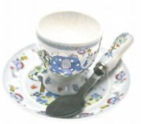 Adorable blue elephant egg cup set with spoon and saucer, perfect for making mealtime fun for toddlers.