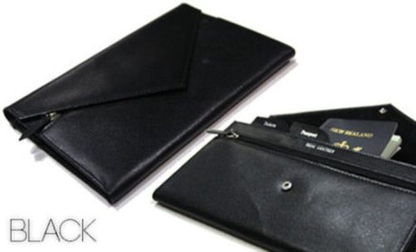 Sleek black genuine leather travel document wallet with organized compartments for tickets, cash, and essential travel papers.