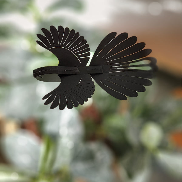 Colorful Mini Fantail plant stake with whimsical wings, crafted from laser-cut acrylic, ideal for supporting plants in style.