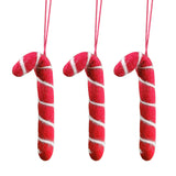 Whimsical felt candy cane decorations, handmade in Nepal, perfect for Christmas trees and festive decor.