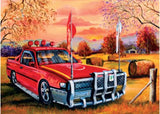 1000-piece puzzle featuring a Red Ute in lush Australian bush, crafted by artist Jenny Sanders for car and puzzle enthusiasts.