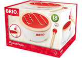 Brightly colored BRIO toddler musical drum with hidden storage for drumstick, perfect for encouraging rhythm and motor skills in young children.