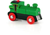 Bright green BRIO BO battery-powered engine with headlights, offering forward/reverse functions for kids' railway adventures.