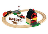 Colorful BRIO Farm Railway Set with 20 pieces, featuring a farm engine, animals, and vehicles for imaginative play.