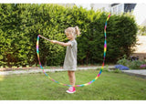 Vibrant BS Toys Dance Ribbon with wooden stick, perfect for inspiring creativity and motor skills in children through movement.