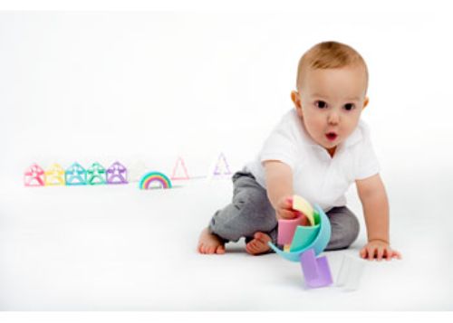 Pastel wooden rainbow set with six pieces, perfect for creative play, stacking, and enhancing toddler development.