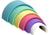 Pastel-colored wooden rainbow set for creative play, ideal for toddlers and Montessori learning environments.