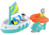 Colorful bath toy set featuring a boat, captain, diver, whale, and life ring for imaginative water play adventures.