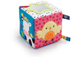 Colorful, soft activity cube with textures and teething clips for sensory exploration and early motor skill development.