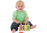 Colorful wooden pop-up toy for toddlers, featuring 4 figures that spring up and down to promote hand-eye coordination and color awareness.