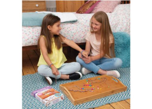 Colorful Galt Friendship Bracelets kit for kids, featuring threads, beads, and a foam braiding wheel for creative DIY crafting.