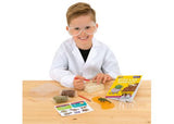 Exciting dinosaur excavation kit for kids, featuring fossils, slime, molds, and a vibrant Lab booklet for paleontology fun.