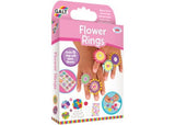 Colorful crafting kit for kids ages 6+ to create and wear 12 unique flower rings with fabric flowers and decorative stickers.