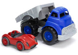 Eco-friendly blue flatbed truck transporting a red race car, made from 100% recycled plastic, perfect for imaginative play.