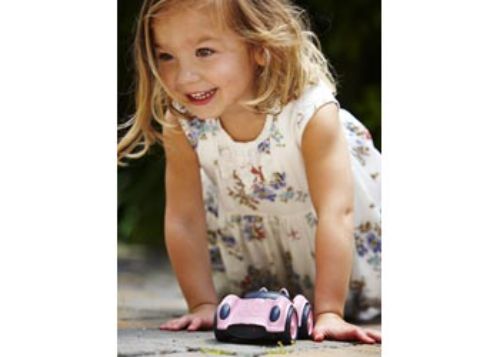 Bright pink Green Toys race car made from 100% recycled plastic, perfect for eco-friendly imaginative play for toddlers.