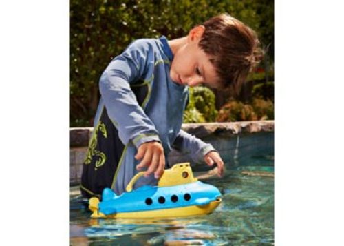 Colorful Green Toys submarine with yellow cabin, made from recycled plastic, designed for water play and motor skill development.