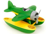 Bright green eco-friendly seaplane toy with spinning propeller, designed for imaginative play in water and air.