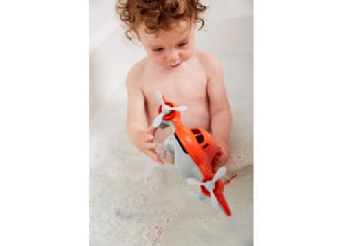 Eco-friendly Green Toys Fire Plane floats, with spinning propellers and sprinkle spouts for imaginative bath time adventures.