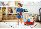 Eco-friendly Green Toys Wagon made from 100% recycled plastic, featuring sturdy construction and a unique cotton rope handle.