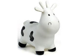 Inflatable Happy Hopperz White Cow for toddlers, promoting fun bouncing play and motor skill development.