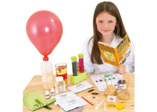 Kids conducting chaotic kitchen experiments with creepy bugs, foul food and engaging science activities in a colorful kit.